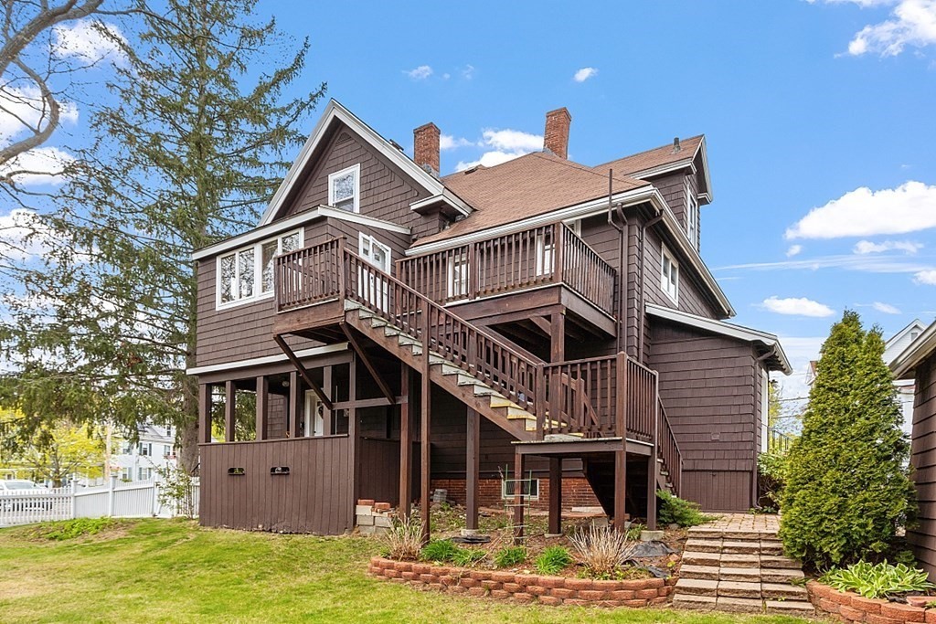 2 Bond Place Saugus, MA 01906 - Photo 7 of 42 a front view of house with yard