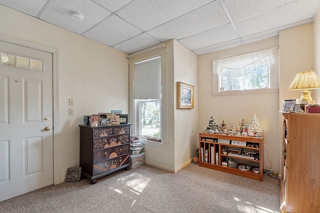 2 Bond Place Saugus, MA 01906 - Photo 9 of 42 a room with furniture and a window