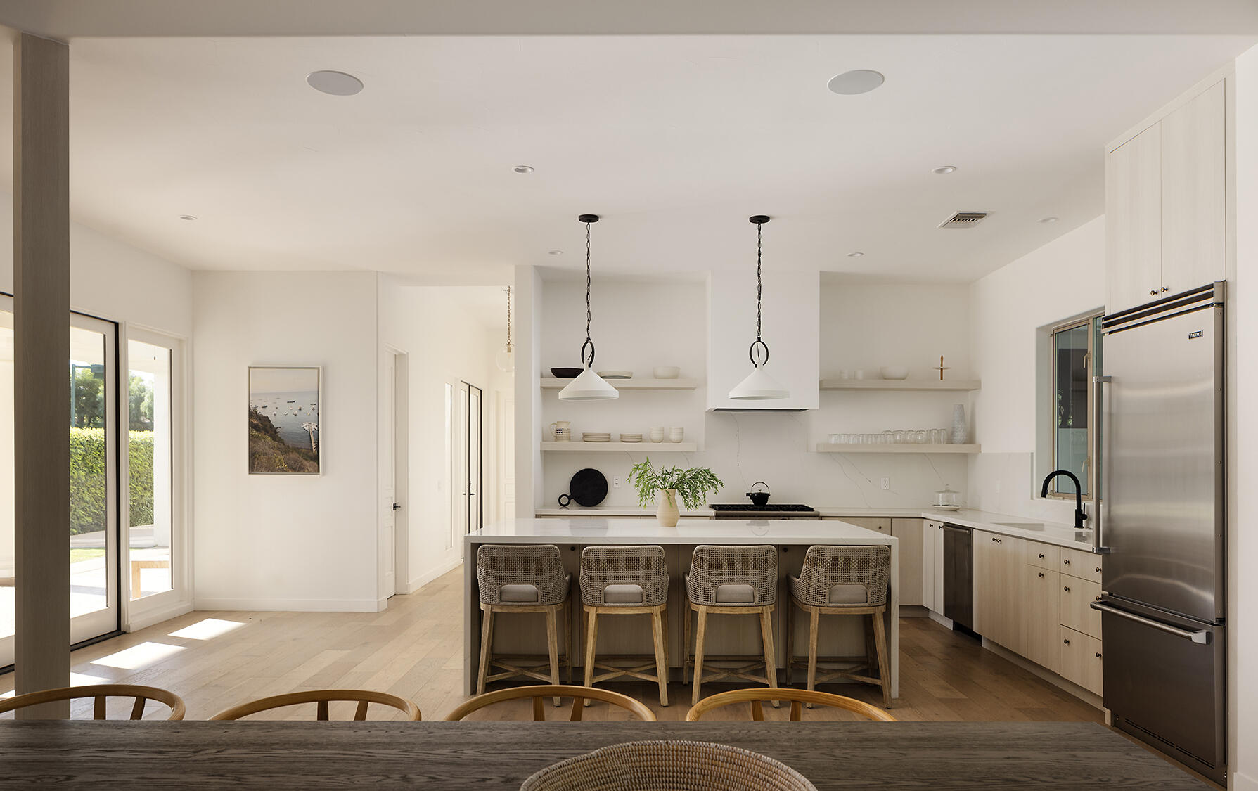 72355 Morningstar Road Rancho Mirage, CA 92270 - Photo 16 of 50 a kitchen with stainless steel appliances granite countertop a sink and a refrigerator