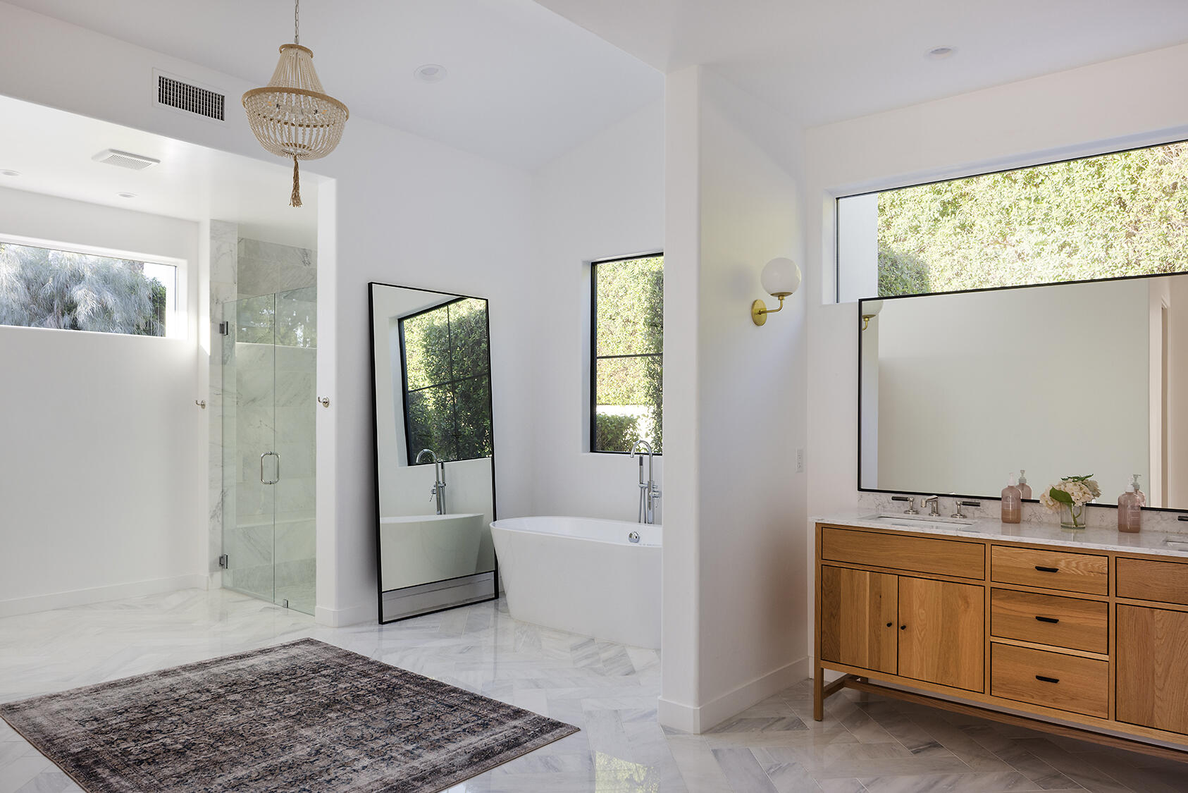 72355 Morningstar Road Rancho Mirage, CA 92270 - Photo 23 of 50 a spacious bathroom with a granite countertop sink a mirror and a bathtub