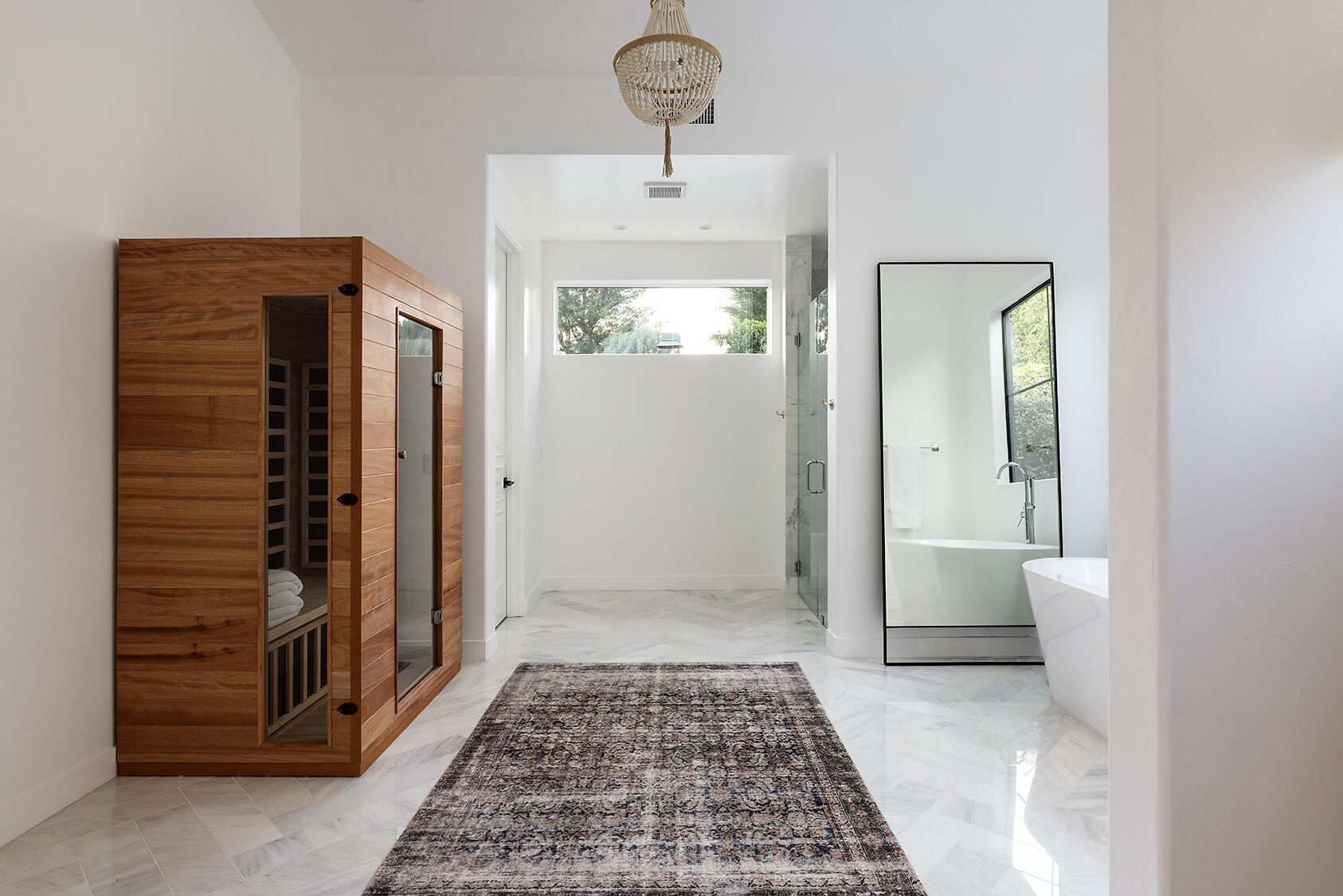 72355 Morningstar Road Rancho Mirage, CA 92270 - Photo 24 of 50 a view of a hallway to a livingroom with furniture and windows