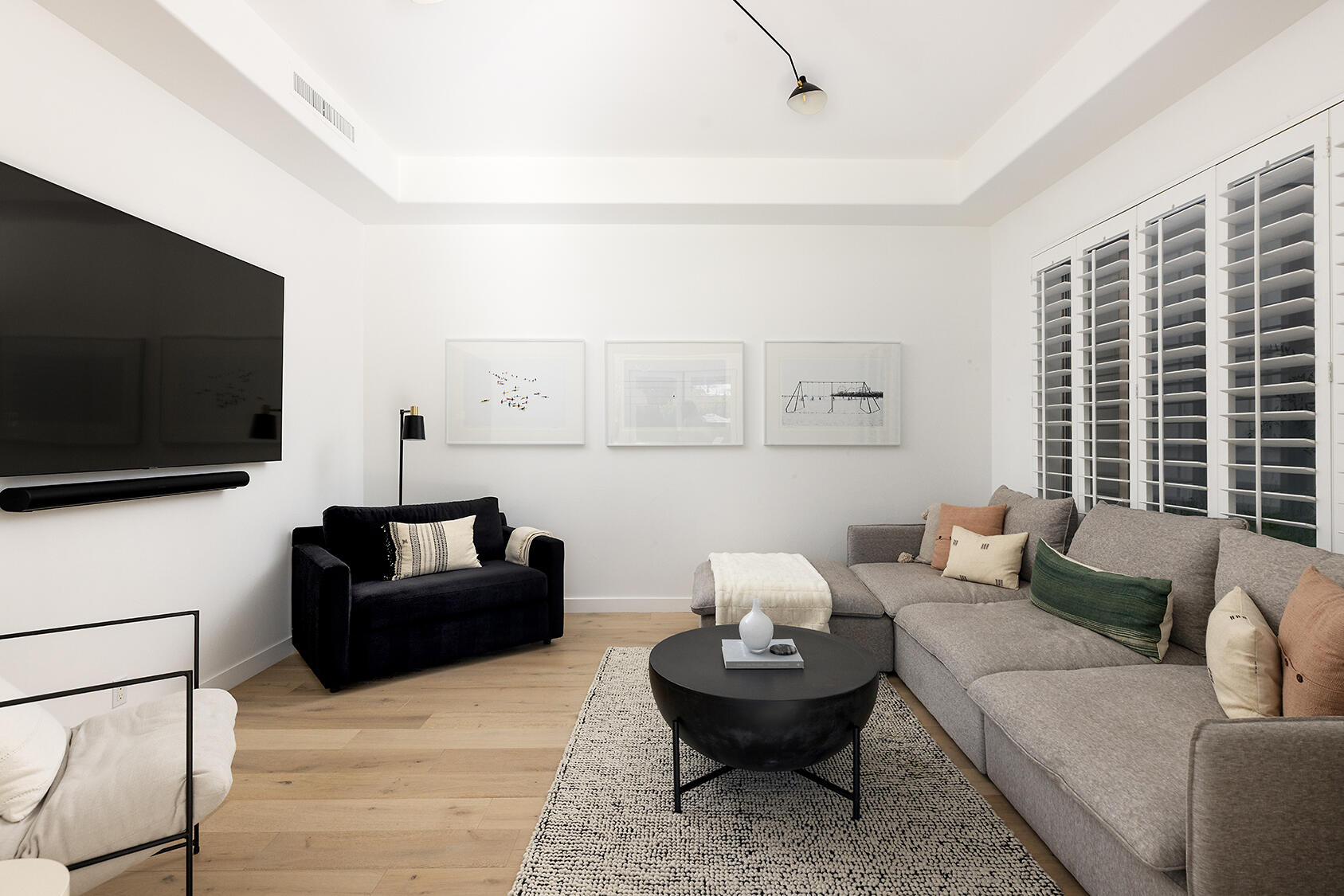 72355 Morningstar Road Rancho Mirage, CA 92270 - Photo 30 of 50 a living room with furniture and a flat screen tv