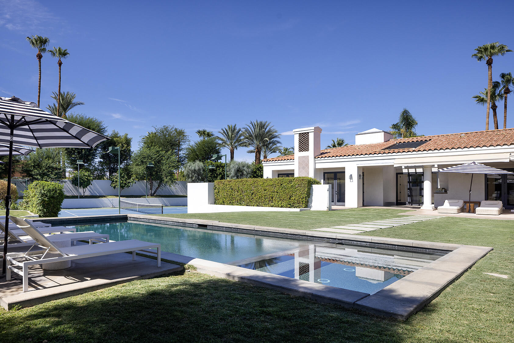 72355 Morningstar Road Rancho Mirage, CA 92270 - Photo 36 of 50 a view of a house with a yard