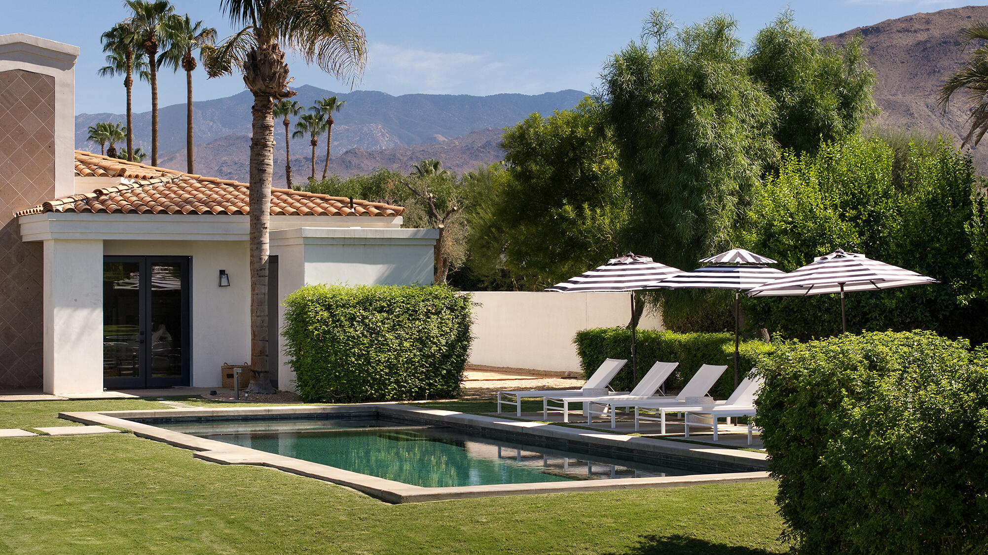 72355 Morningstar Road Rancho Mirage, CA 92270 - Photo 39 of 50 a view of a house with pool and chairs