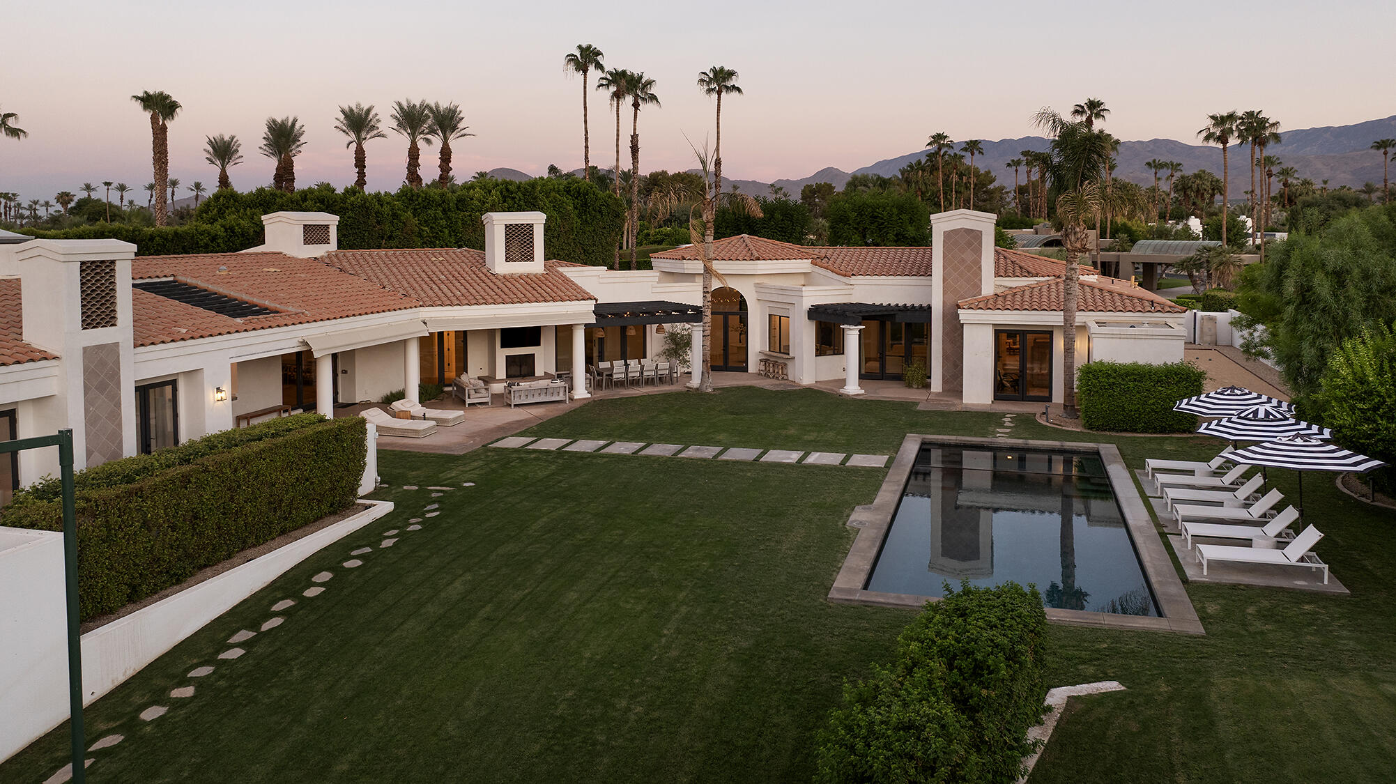 72355 Morningstar Road Rancho Mirage, CA 92270 - Photo 46 of 50 a front view of a house with a yard