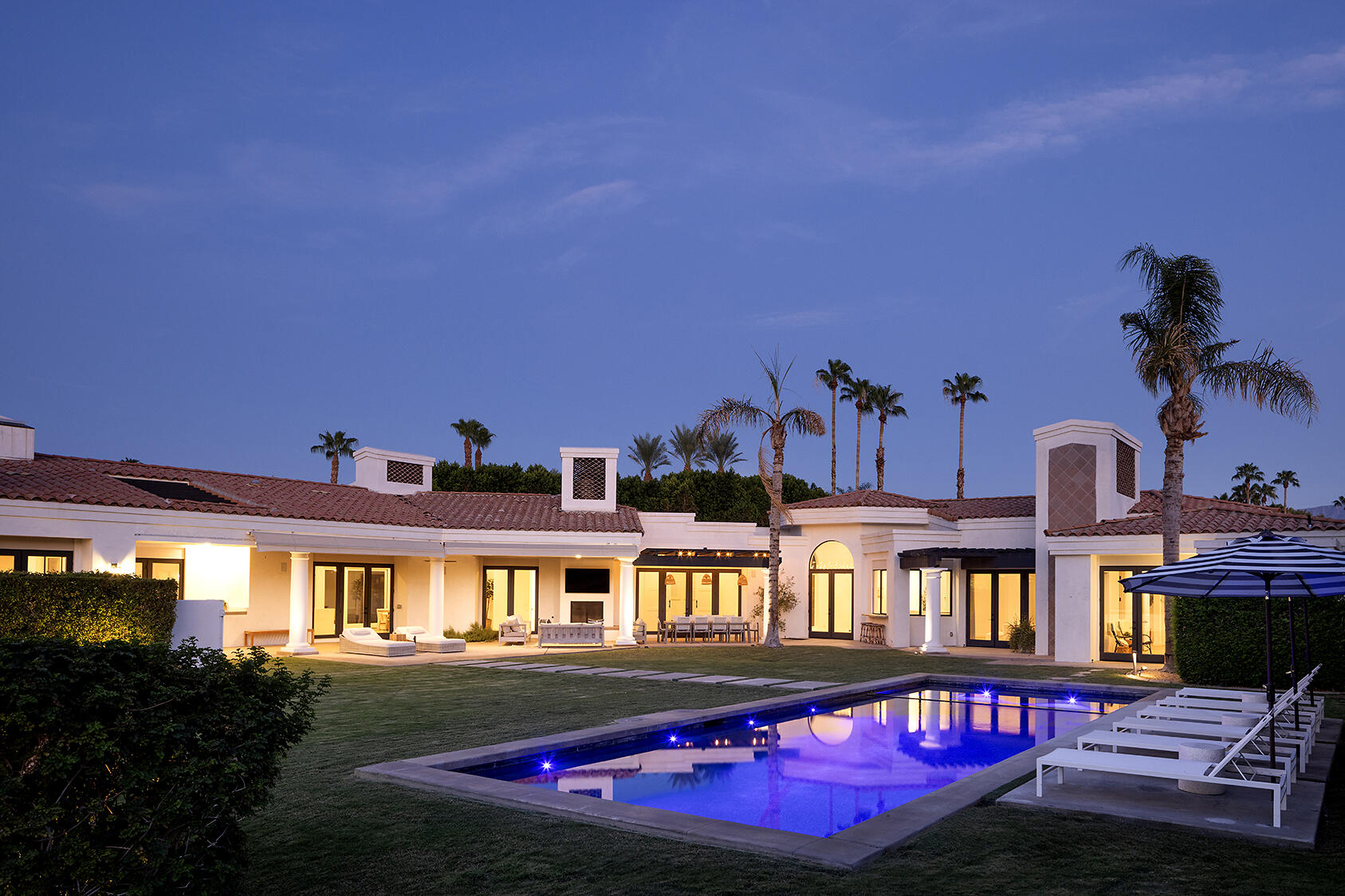72355 Morningstar Road Rancho Mirage, CA 92270 - Photo 5 of 50 a front view of residential houses with an outdoor space and seating
