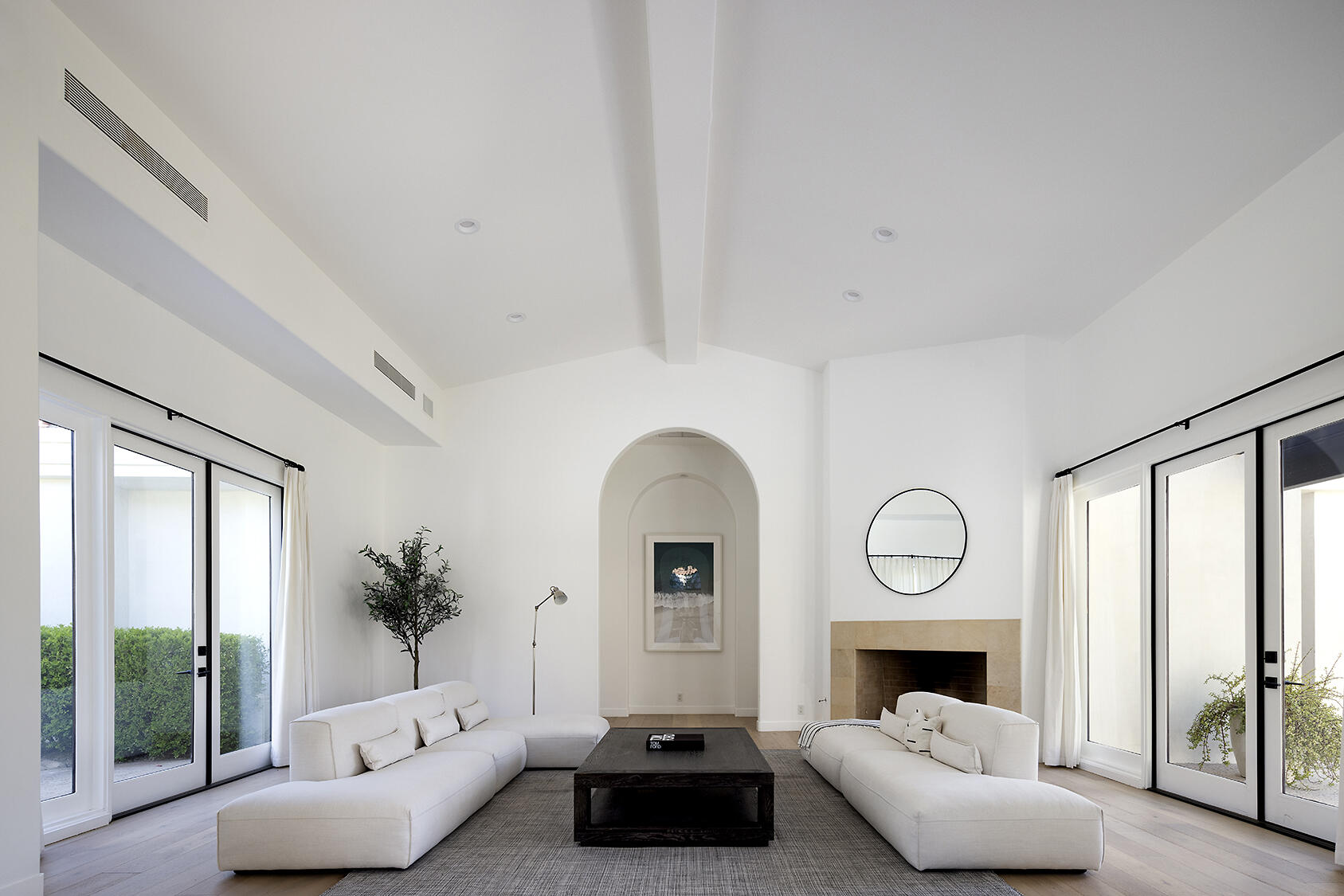 72355 Morningstar Road Rancho Mirage, CA 92270 - Photo 10 of 50 a living room with furniture fireplace and a large window