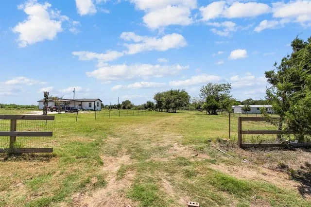 a view of a lake with a building in front of it