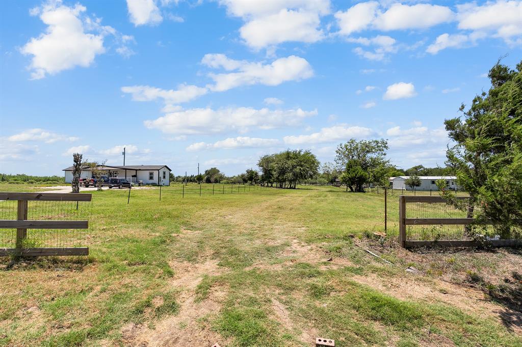 a view of a lake with a building in front of it