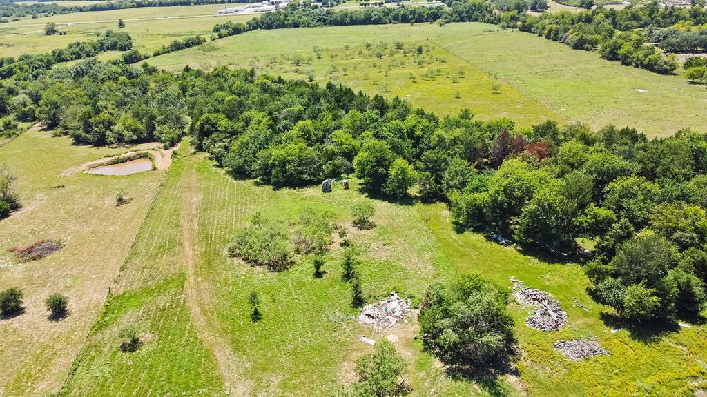 2797 County Road 3417 Wills Point, TX 75169 - Photo 14 of 22 a view of a large yard with green space