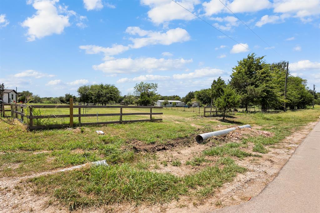 2797 County Road 3417 Wills Point, TX 75169 - Photo 17 of 22 a view of a golf course with a garden