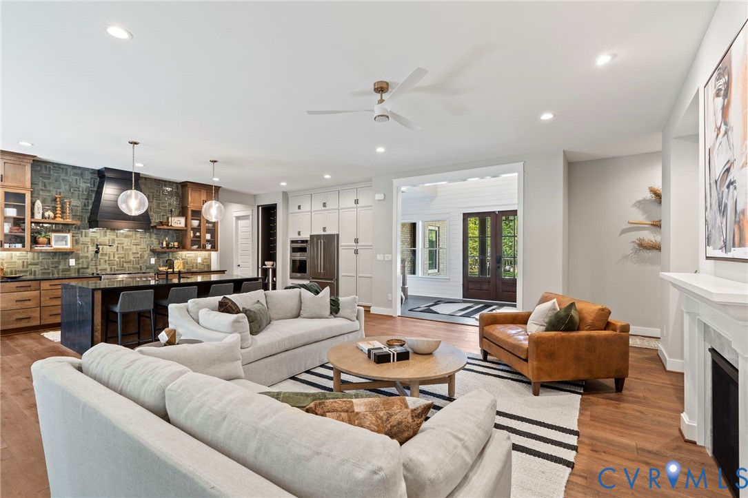 4764 Gooden Trail Quinton, VA 23141 - Photo 24 of 50 Living area with light wood-type flooring, a ceili