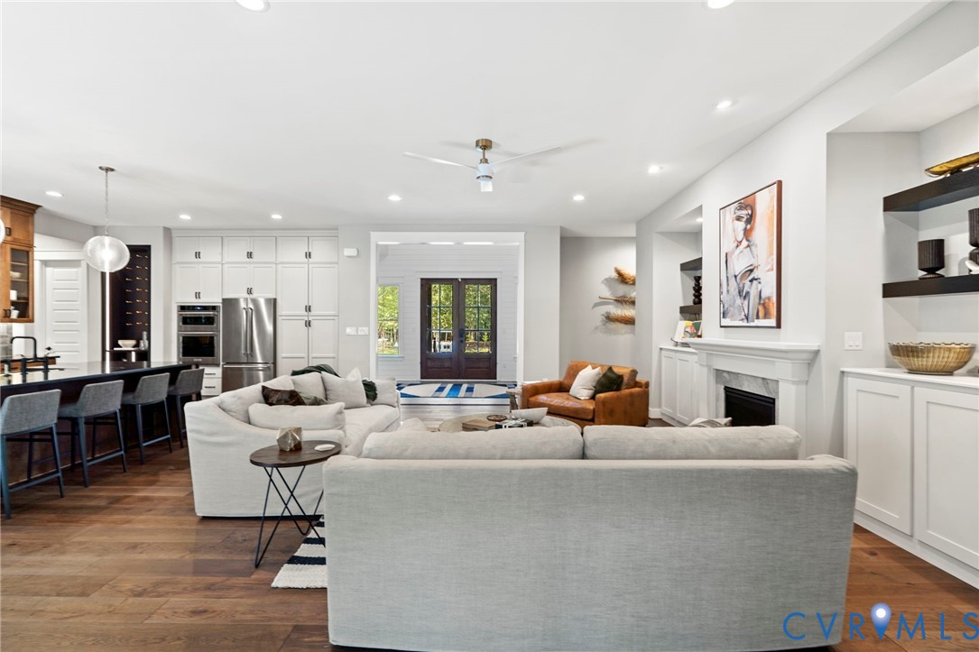 4764 Gooden Trail Quinton, VA 23141 - Photo 25 of 50 Living room featuring a fireplace, recessed lighti