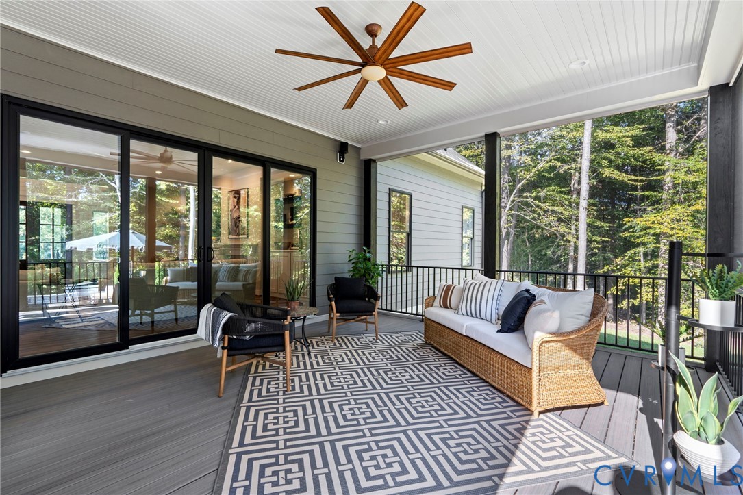 4764 Gooden Trail Quinton, VA 23141 - Photo 27 of 50 Sunroom with ceiling fan, an outdoor living space,