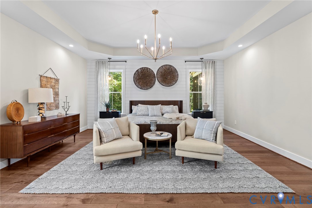 4764 Gooden Trail Quinton, VA 23141 - Photo 28 of 50 Bedroom with a raised ceiling, wood finished floor