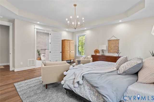 a bed room with furniture and a window