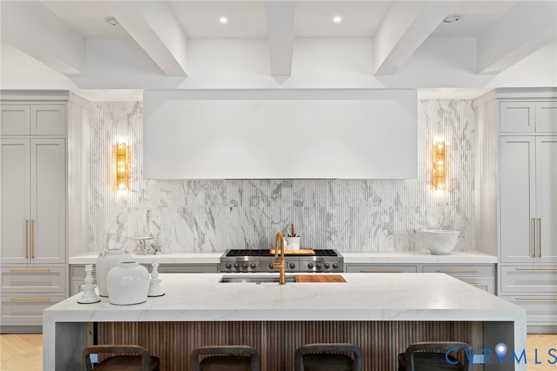 4764 Gooden Trail Quinton, VA 23141 - Photo 4 of 50 Kitchen with light stone counters, a breakfast bar