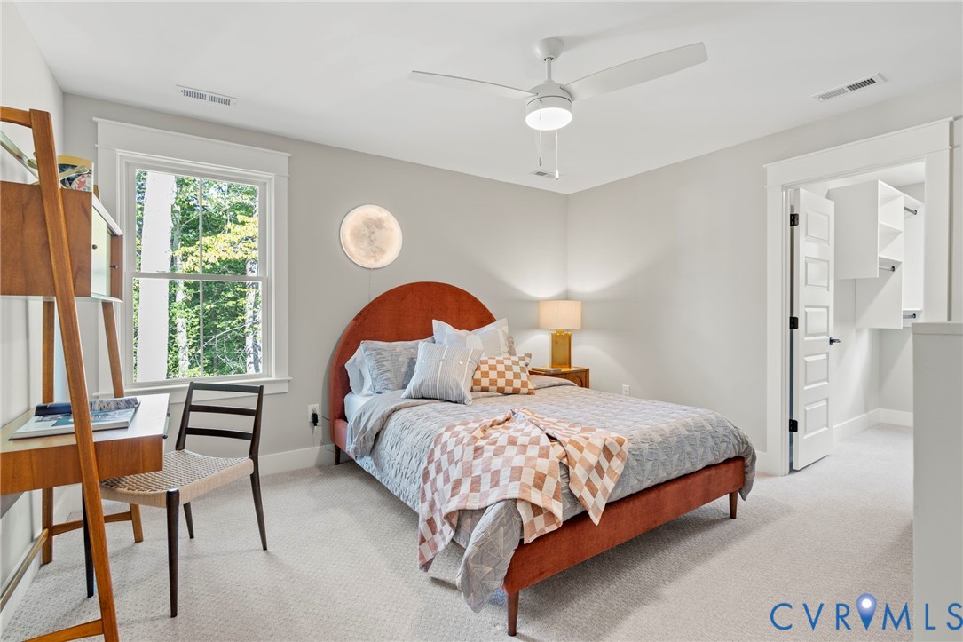 4764 Gooden Trail Quinton, VA 23141 - Photo 40 of 50 Carpeted bedroom with a ceiling fan and baseboards