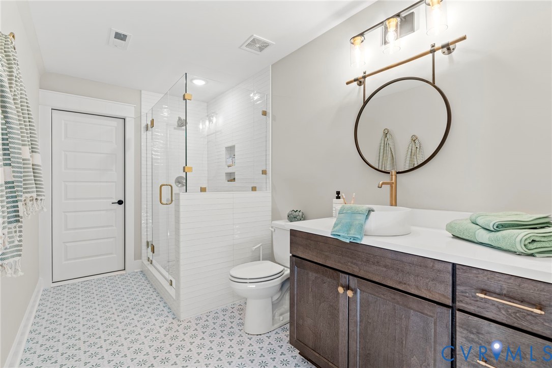 4764 Gooden Trail Quinton, VA 23141 - Photo 45 of 50 Full bathroom featuring a shower stall and vanity