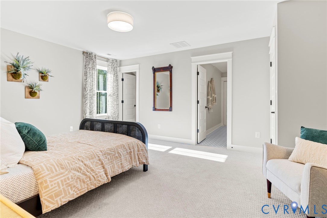 4764 Gooden Trail Quinton, VA 23141 - Photo 48 of 50 Carpeted bedroom featuring baseboards and ensuite