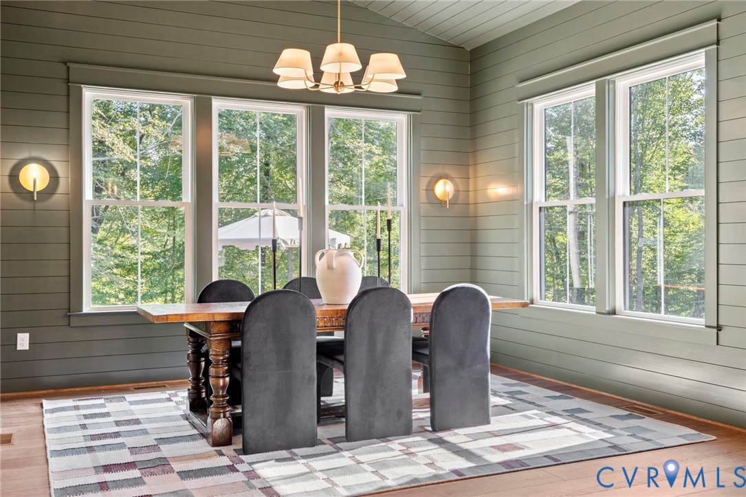 4764 Gooden Trail Quinton, VA 23141 - Photo 7 of 50 Dining space with wood-type flooring, vaulted ceil