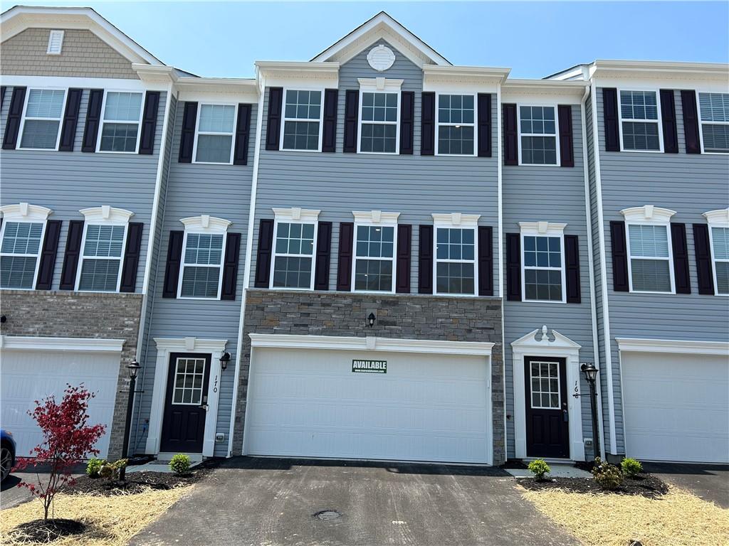 a front view of residential houses