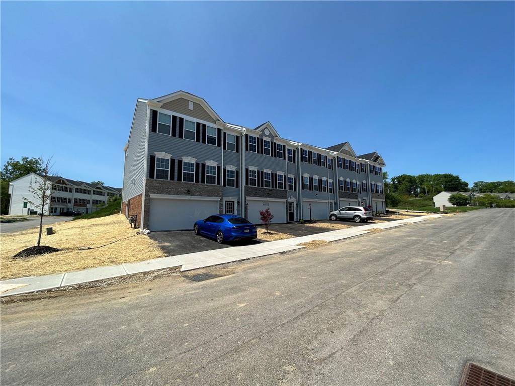 168 Lockheed Drive Coraopolis, PA 15108 - Photo 2 of 6 a view of a large building next to a road