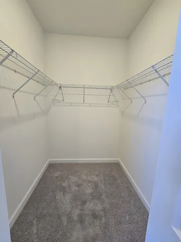 a view of a room with racks on the wall