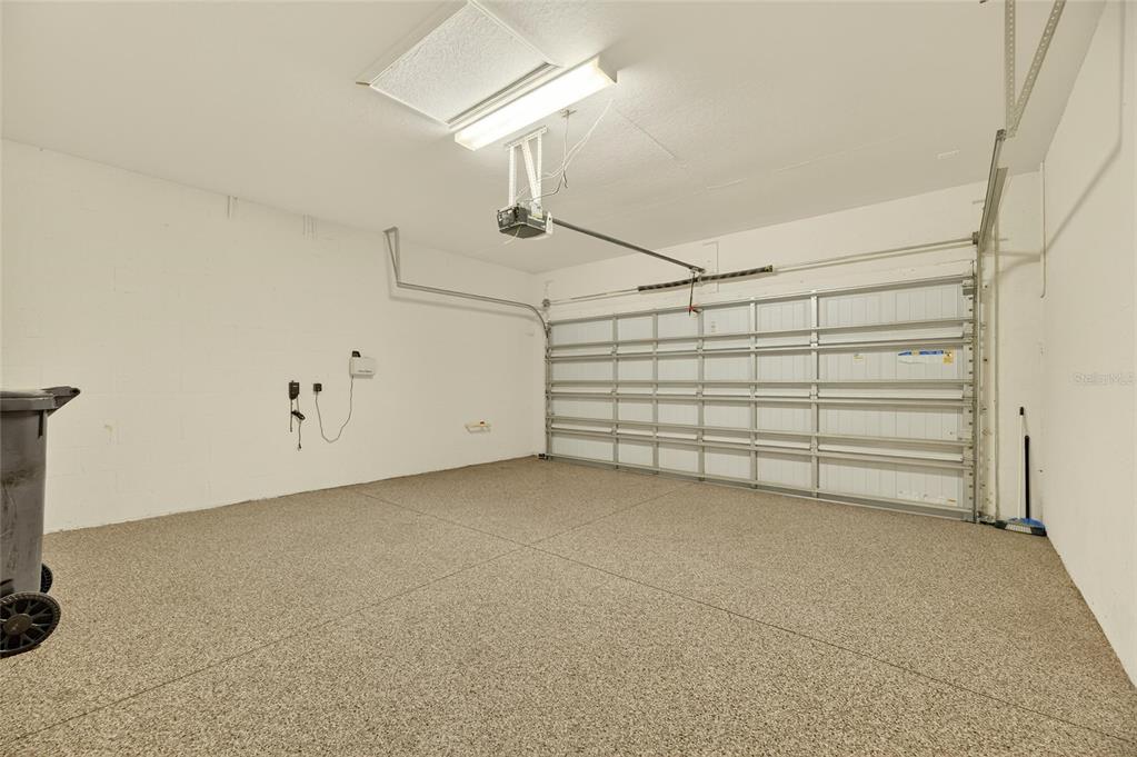 5811 Caldera Ridge Drive Lithia, FL 33547 - Photo 13 of 44 a view of a garage