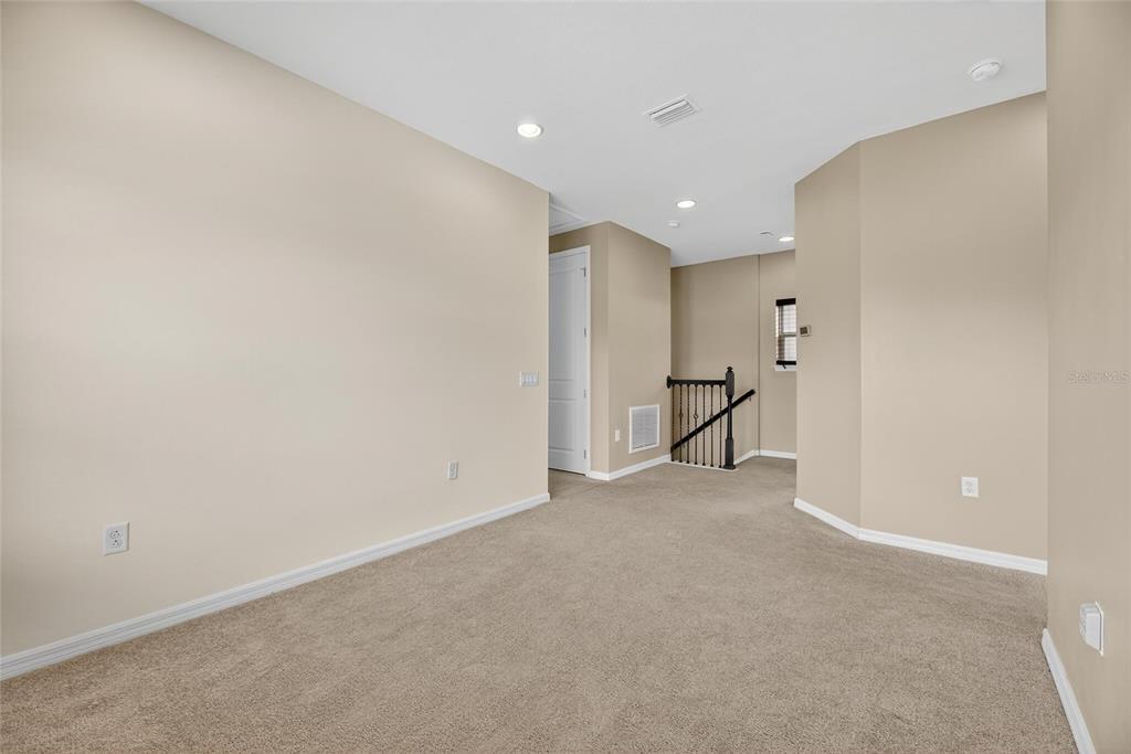 5811 Caldera Ridge Drive Lithia, FL 33547 - Photo 18 of 44 a view of an empty room