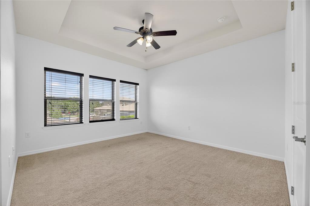5811 Caldera Ridge Drive Lithia, FL 33547 - Photo 19 of 44 a view of an empty room with a window