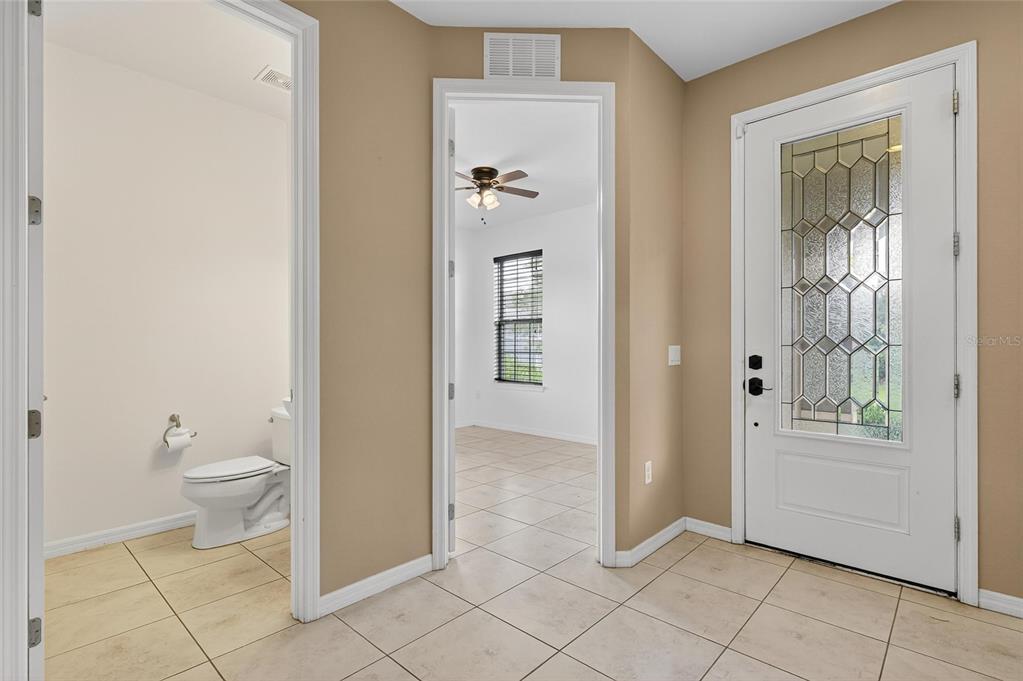 5811 Caldera Ridge Drive Lithia, FL 33547 - Photo 24 of 44 a bathroom with a toilet