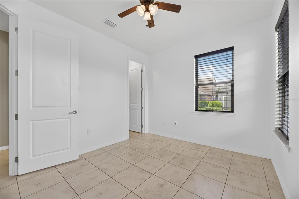 5811 Caldera Ridge Drive Lithia, FL 33547 - Photo 26 of 44 a view of an empty room with a window