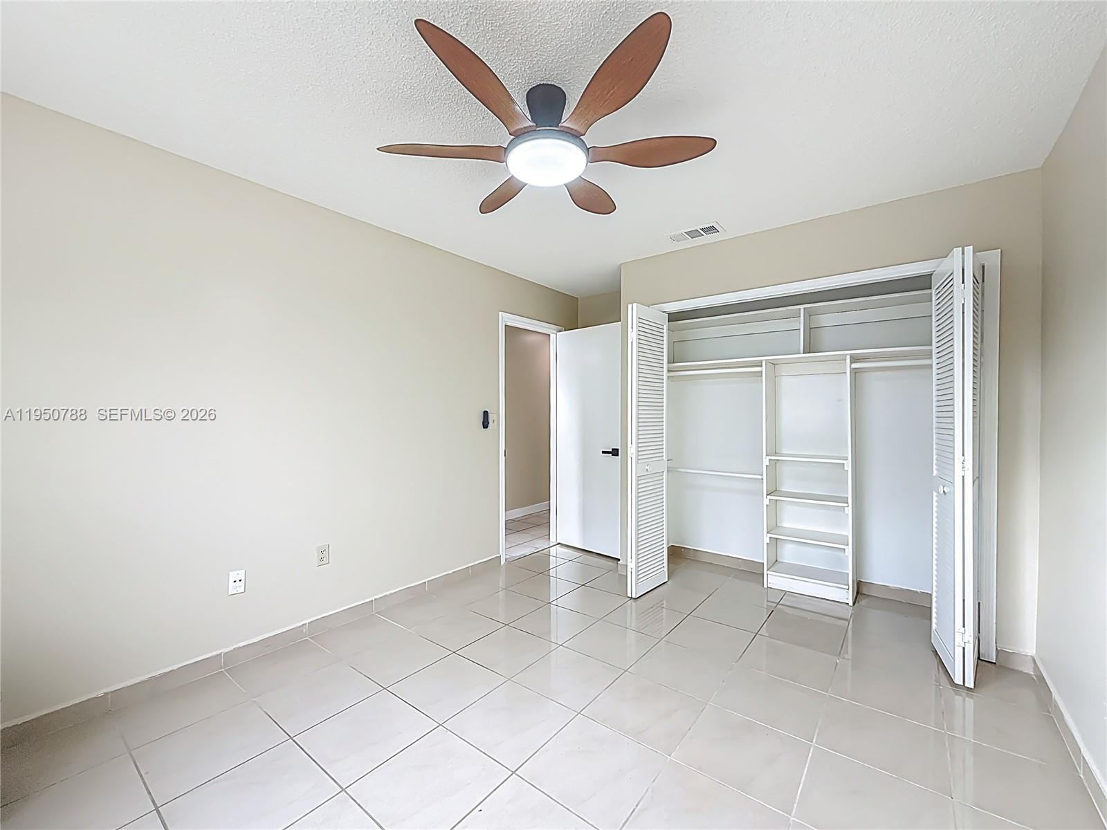 12787 Northwest 10th Lane Miami, FL 33182 - Photo 26 of 48 a view of an empty room