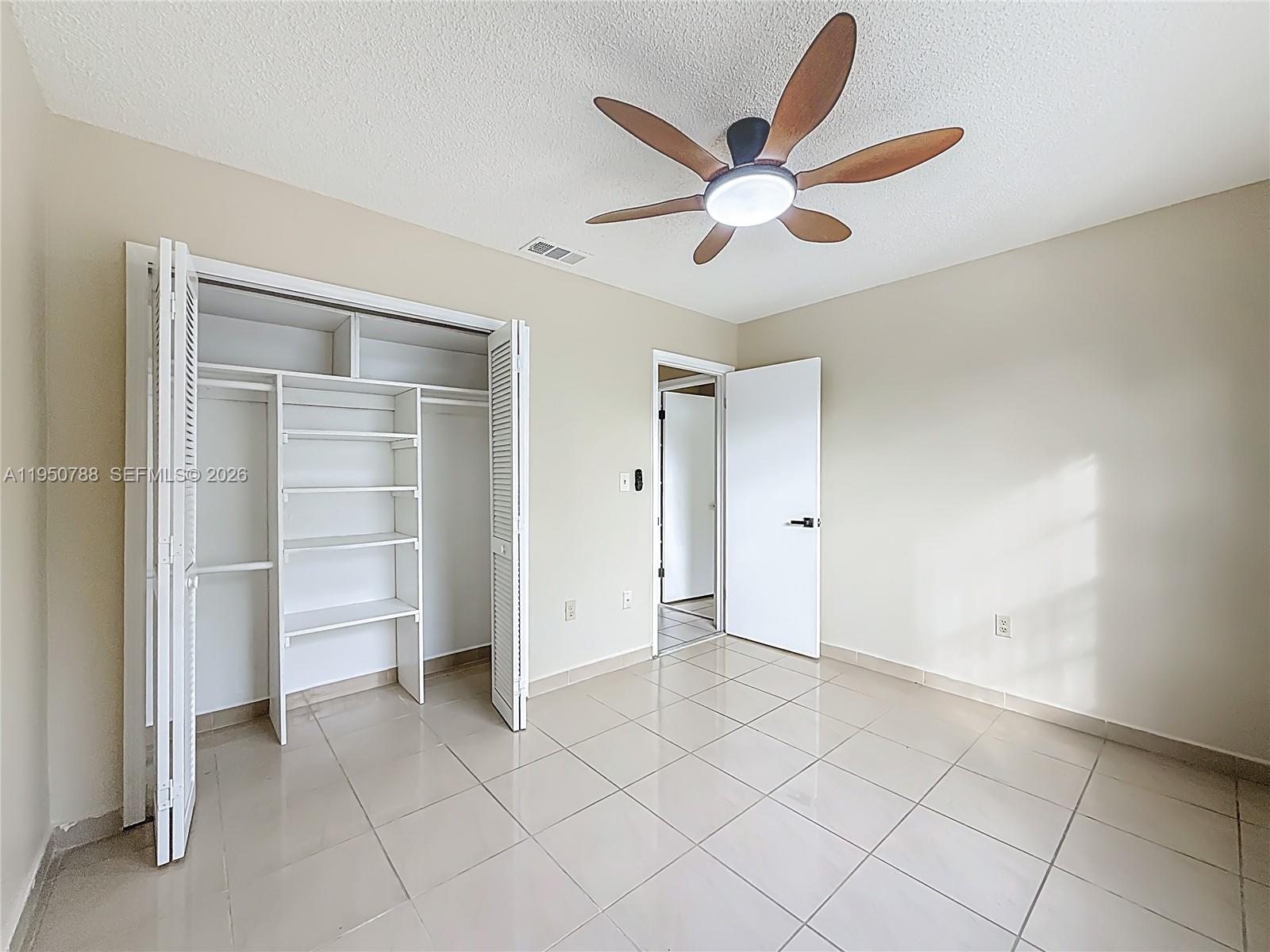 12787 Northwest 10th Lane Miami, FL 33182 - Photo 29 of 48 a view of an empty room