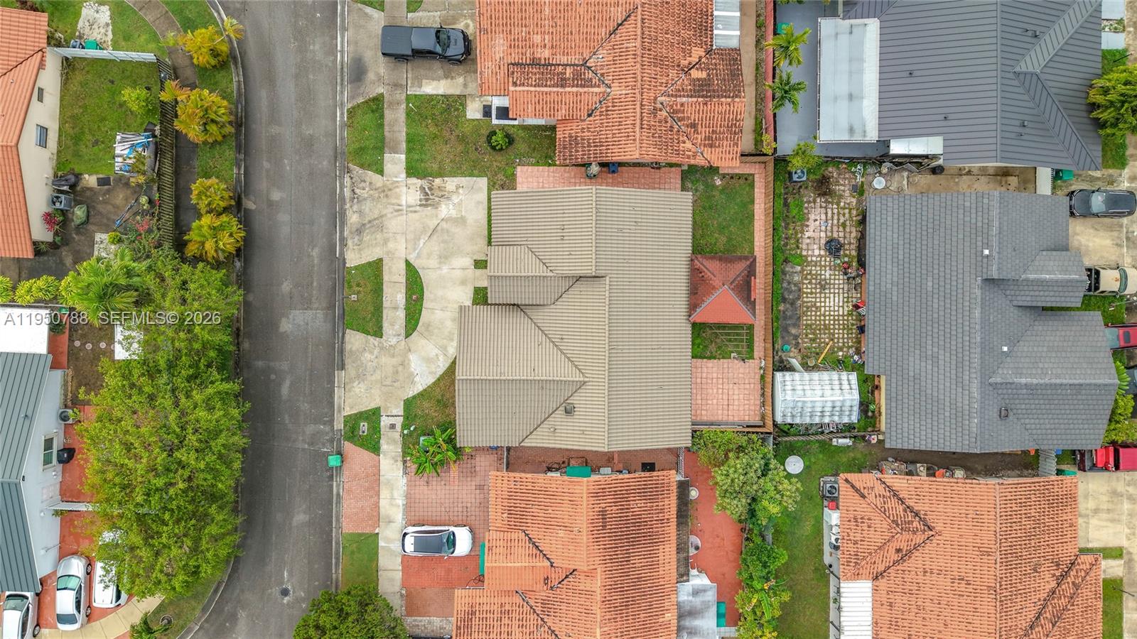 12787 Northwest 10th Lane Miami, FL 33182 - Photo 44 of 48 an aerial view of residential houses with outdoor space