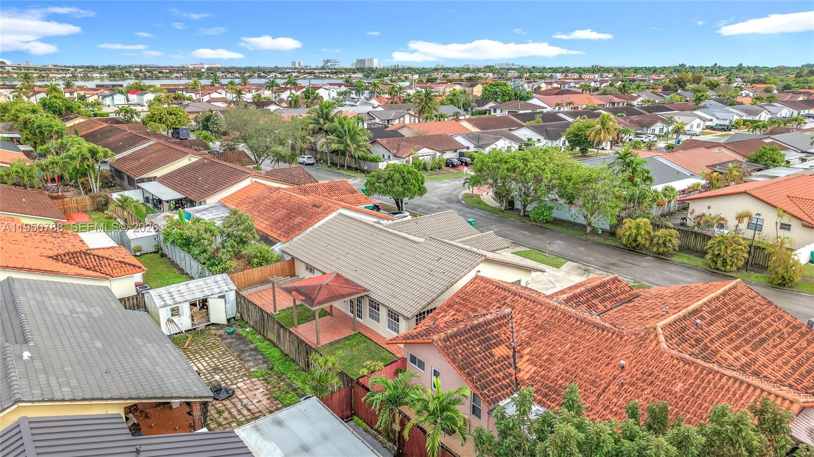 12787 Northwest 10th Lane Miami, FL 33182 - Photo 46 of 48 an aerial view of residential houses with outdoor space