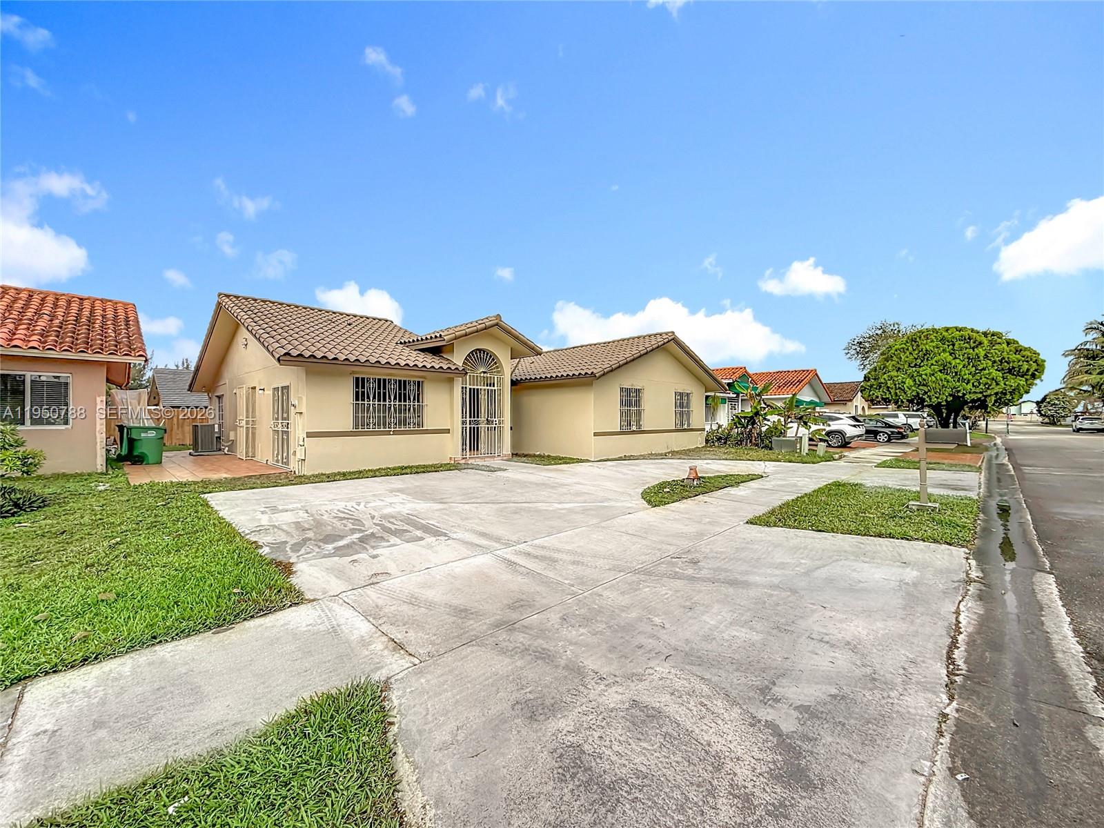 12787 Northwest 10th Lane Miami, FL 33182 - Photo 5 of 48 a view of outdoor space yard and front view of a house