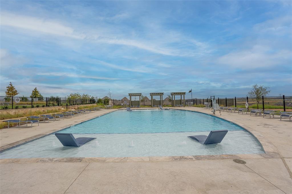 10505 Trail Ridge Drive Fort Worth, TX 76126 - Photo 34 of 37 a view of a swimming pool and lake view