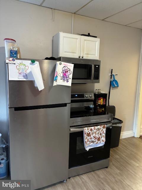 523 North 7th Street Lebanon, PA 17046 - Photo 10 of 13 a refrigerator freezer sitting inside of a kitchen with stainless steel appliances granite countertop a refrigerator stove top oven and sink