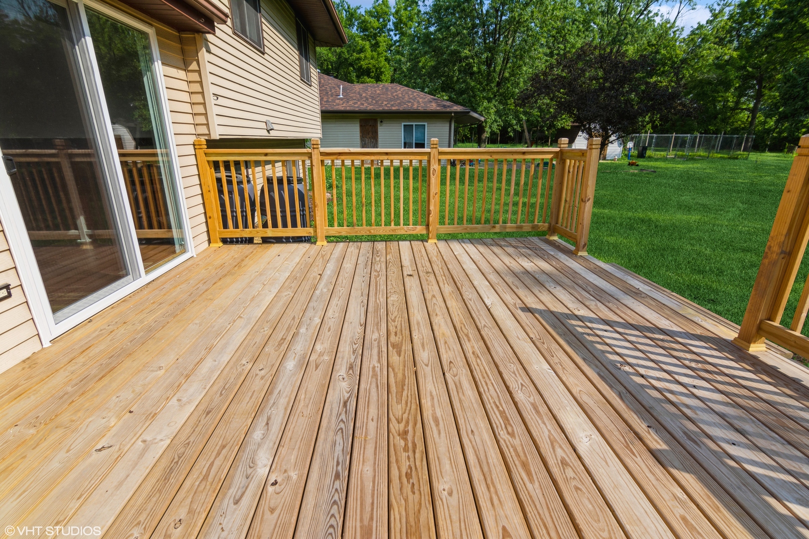 1555 Vincennes Street Crete, IL 60417 - Photo 16 of 18 a view of backyard with deck