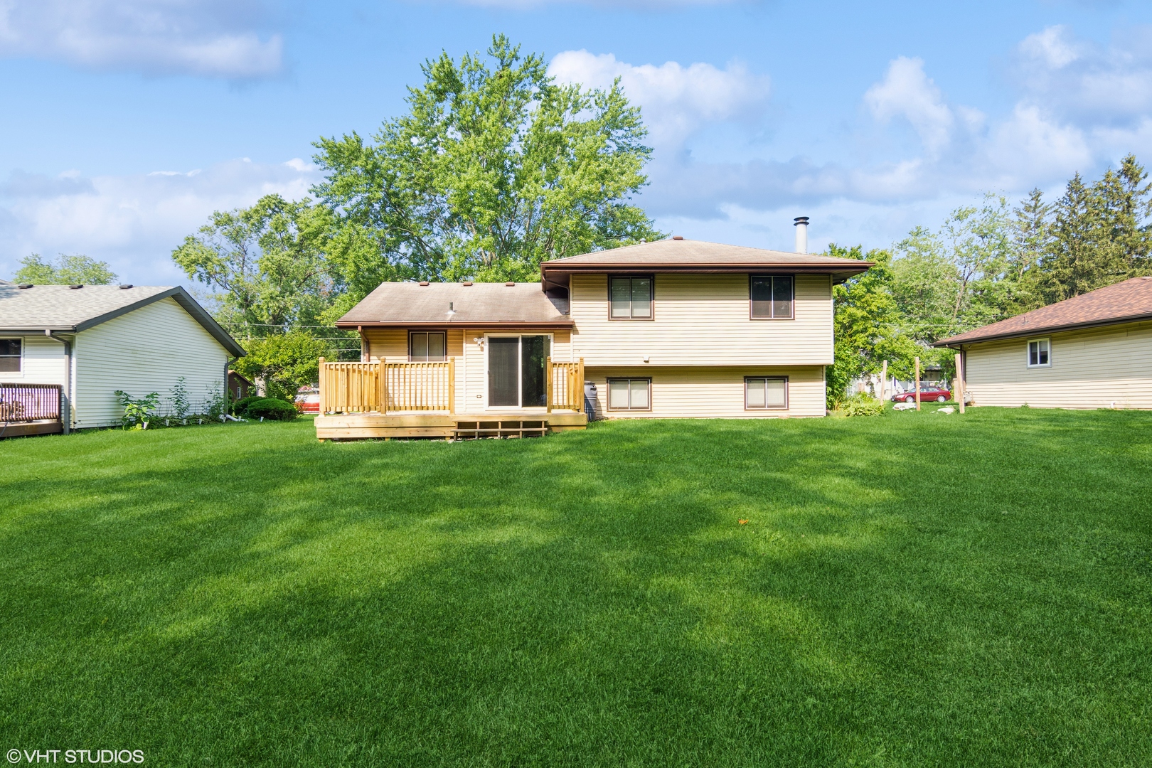 1555 Vincennes Street Crete, IL 60417 - Photo 17 of 18 a front view of house with yard and trees