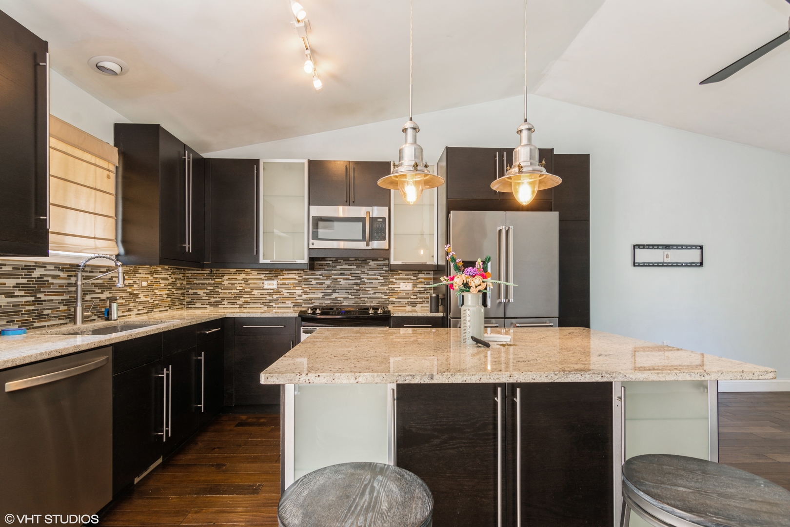 1555 Vincennes Street Crete, IL 60417 - Photo 5 of 18 a kitchen with a sink cabinets and wooden floor