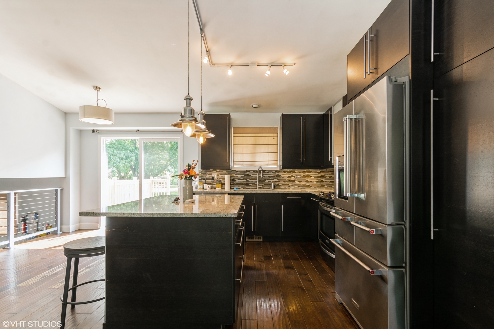 1555 Vincennes Street Crete, IL 60417 - Photo 6 of 18 a kitchen with stainless steel appliances granite countertop a sink stove and refrigerator