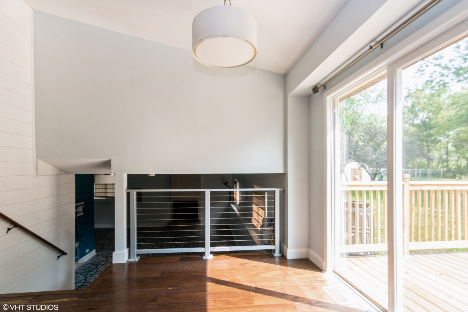 1555 Vincennes Street Crete, IL 60417 - Photo 7 of 18 a view of wooden floor and windows in a room
