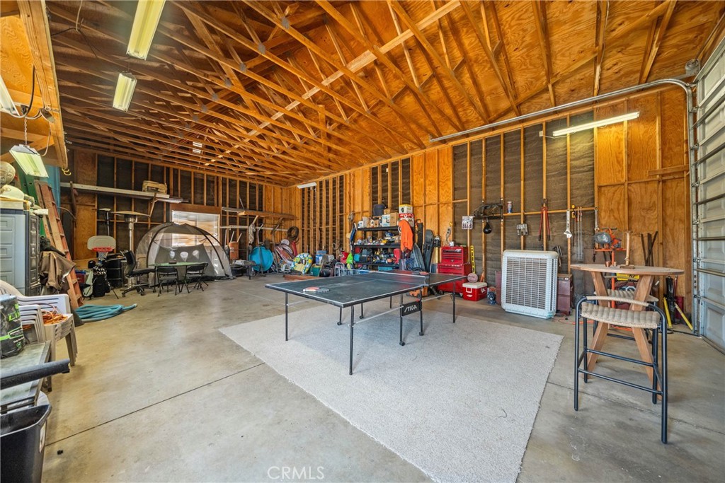 16161 St Timothy Road Apple Valley, CA 92307 - Photo 28 of 35 a view of a patio with table and chairs