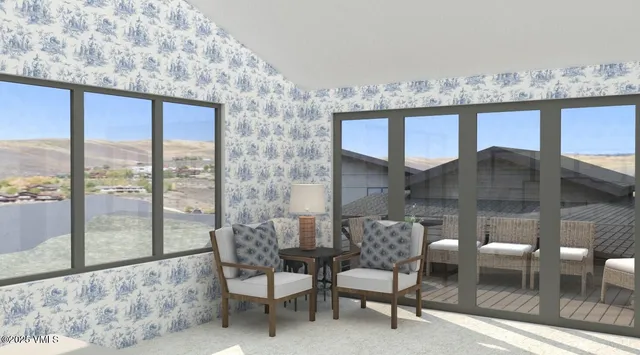 a table and chairs in a room next to a window