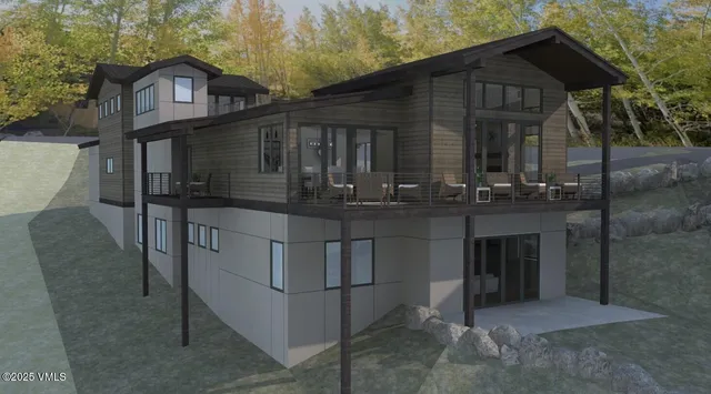 a front view of a house with glass windows
