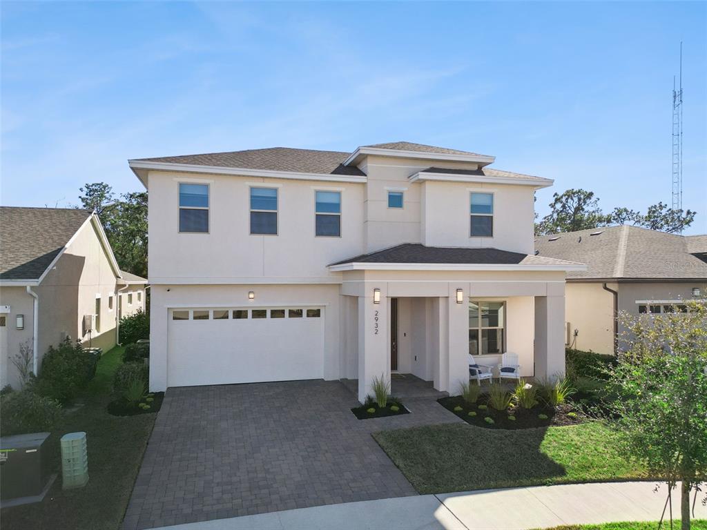 2932 Tupelo Loop St. Cloud, FL 34772 - Photo 32 of 47 front view of a house with a yard