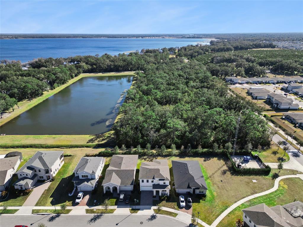 2932 Tupelo Loop St. Cloud, FL 34772 - Photo 35 of 47 an aerial view of residential houses with outdoor space